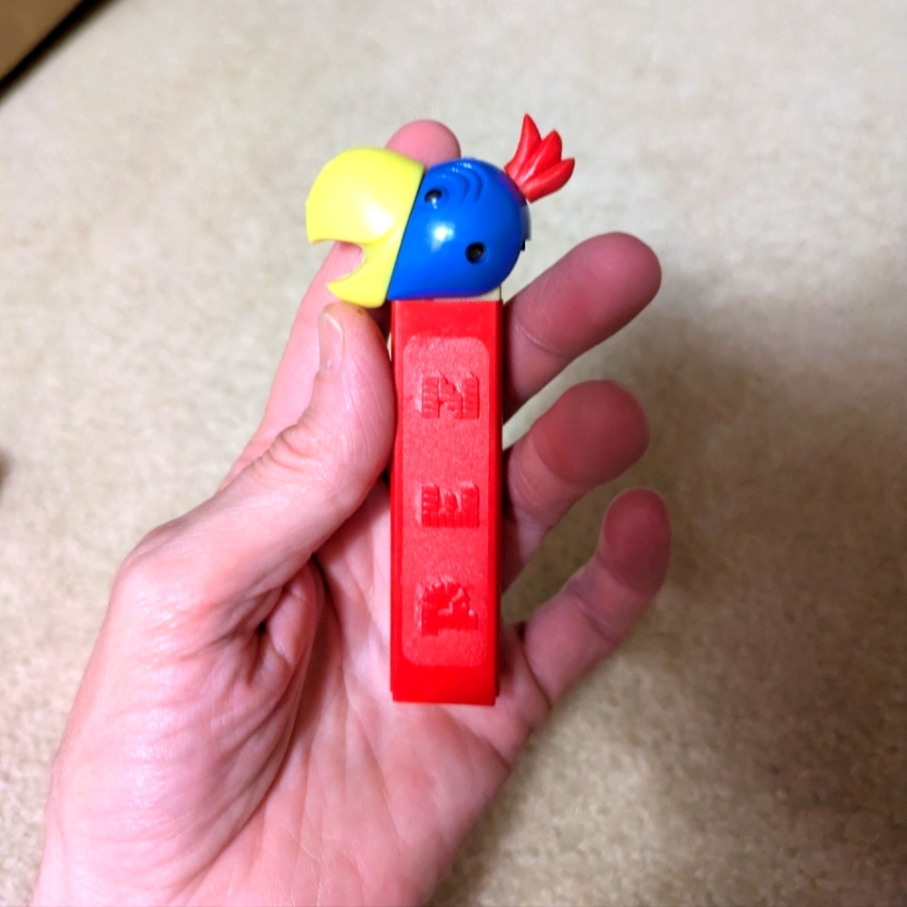 Vintage Toucan/Parrot Bird.  No Feet.  Red Stem, Yellow Beak & Blue Head.  Mint.